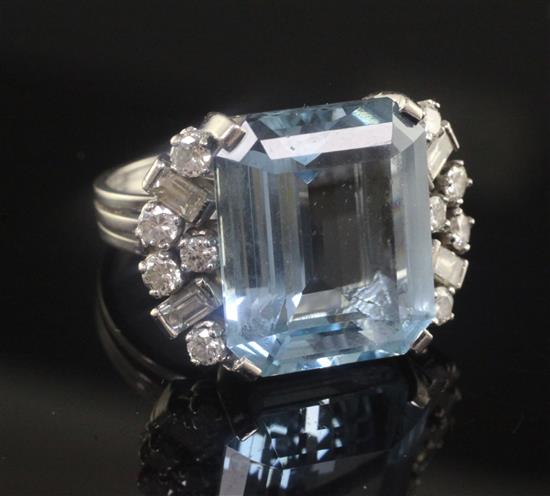 An Art Deco style white metal, aquamarine and diamond set dress ring, size L.